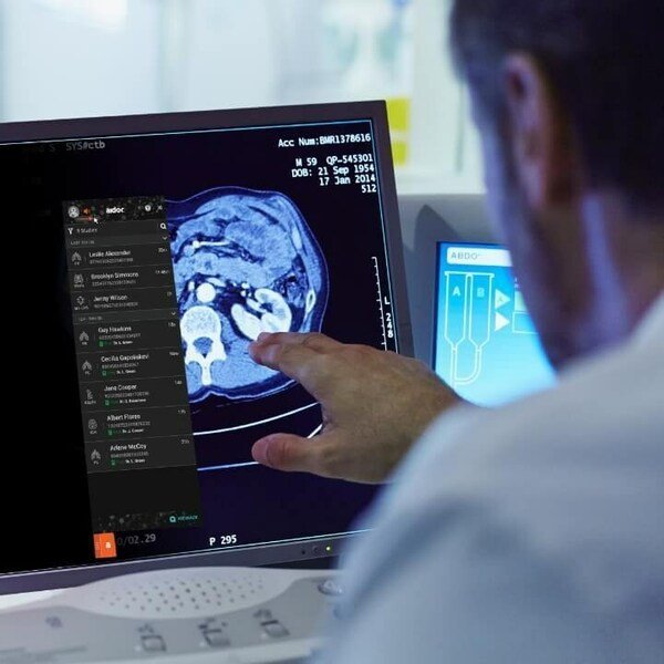 Clinician reading scan notified by Aidoc AI solution